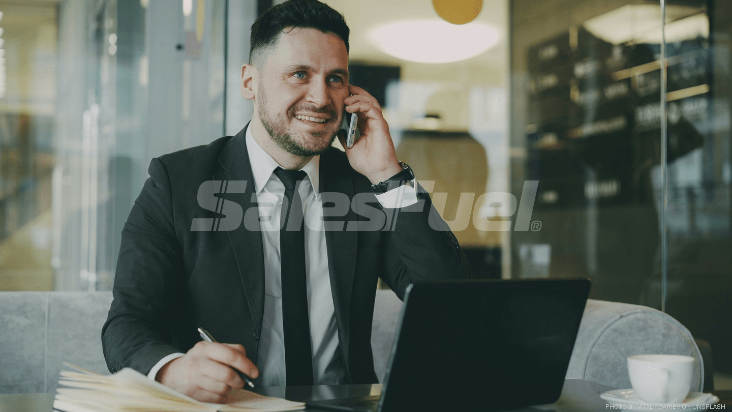 smiling man on the phone