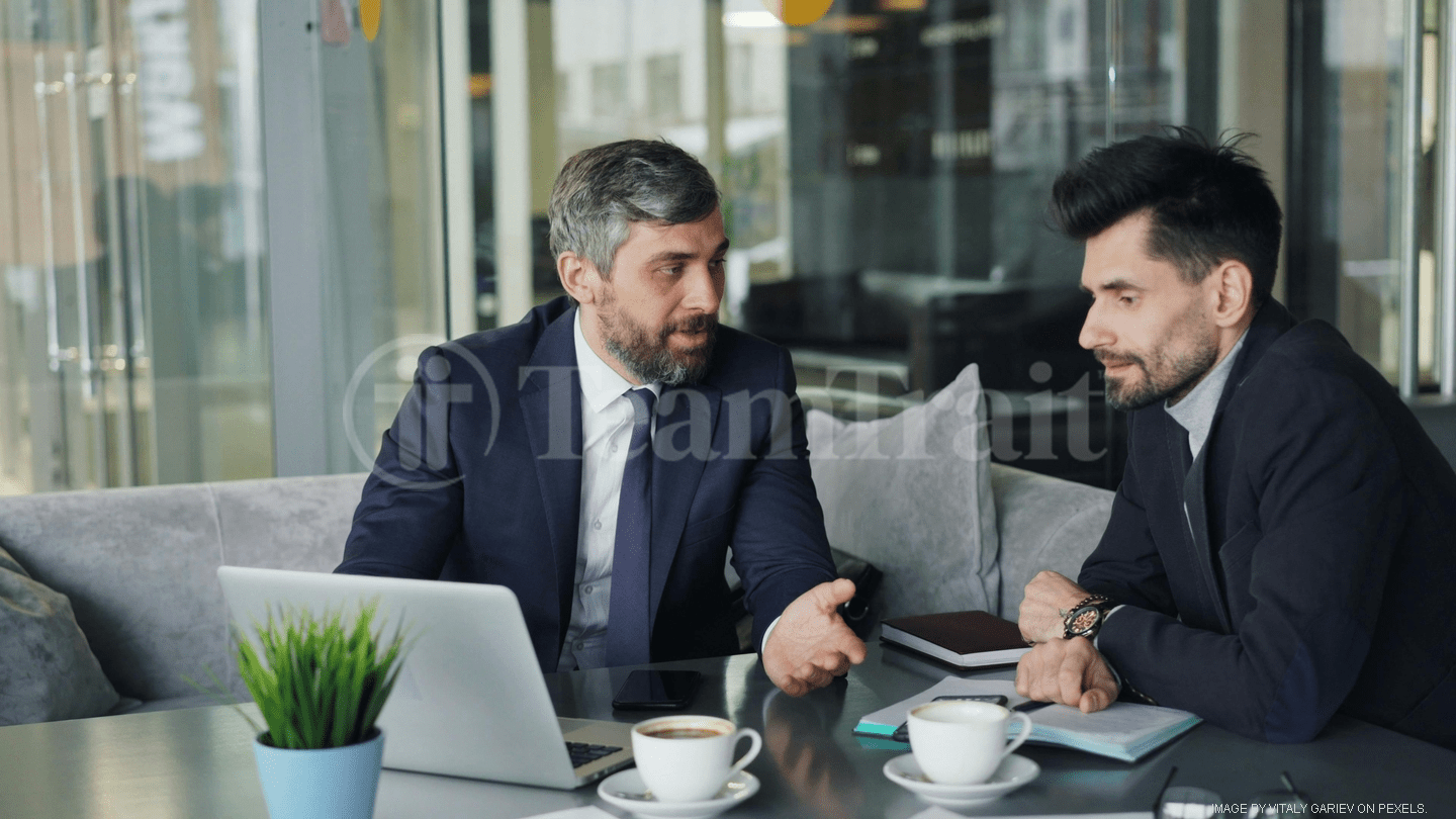 two men meeting